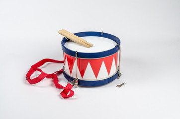 Marching drum with sticks