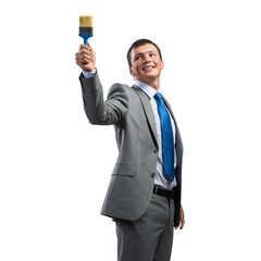 Creative businessman painter holding paintbrush