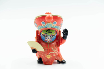 The  Sichuan Chengdu China Opera Mask Changing Doll with the colorful mask and Costume isolated on White Background
