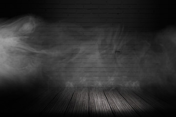 abstract wooden table ,cement wall dark room ,empty space with smoke for display...