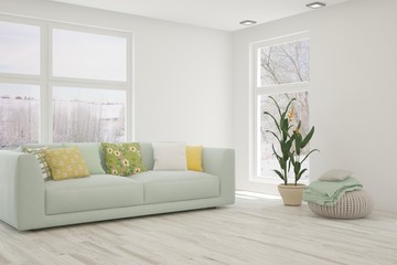 Stylish room in white color with sofa and winter landscape in window. Scandinavian interior design. 3D illustration