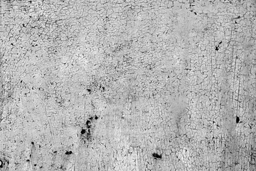 Texture of a metal wall with cracks and scratches which can be used as a background