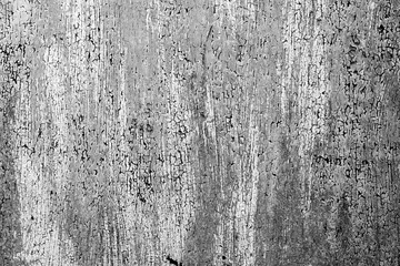 Texture of a metal wall with cracks and scratches which can be used as a background