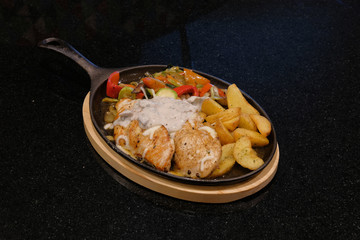 Food on a black background. Restaurant food.