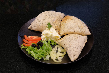Donuts on a black background.