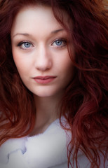 Naklejka premium A beautiful woman with red hair