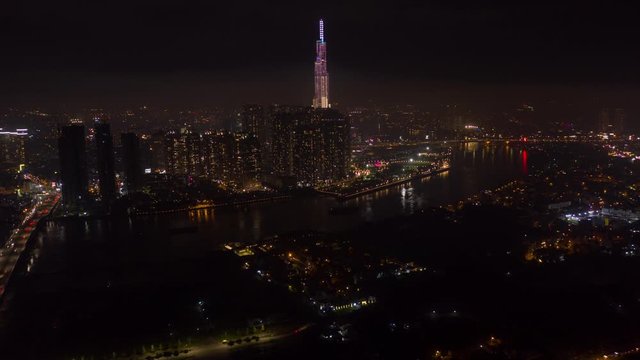 Aerial Vietnam Time Lapse 12102-09 Ho Chi Minh City Waterfront Downtown Night September 2019 4K  Aerial time lapse video of downtown Ho Chi Minh City in Vietnam during beautiful evening night