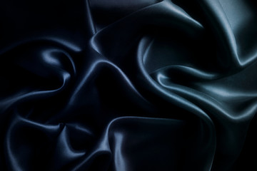 Satin blue silk background, close-up