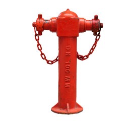 Vintage red street fire hydrant on a gray wall background. Isolated on a white background.