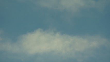 Cumulus and Cirrus clouds in a blue sky