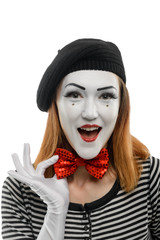 Happy female mime artist, isolated on white