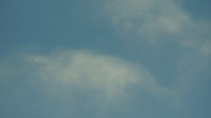 Cumulus and Cirrus clouds in a blue sky