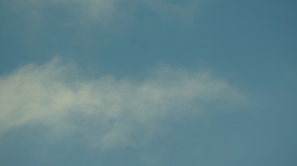 Cumulus and Cirrus clouds in a blue sky