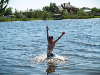 children bathe in the river