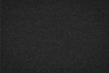 Texture of black gift rough paper with fibers. Dark background for design, template, greeting card, website backdrop.