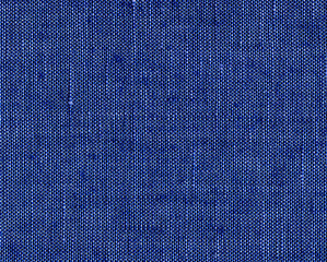 Fototapeta na wymiar Classic cornflower blue linen. Eco fabric with a visible texture of the weave. Dyeing of flax fabric with natural dye. Expensive men's shirt