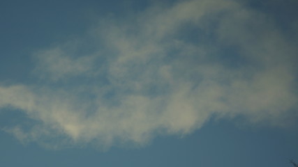 Cumulus and Cirrus clouds in a blue sky