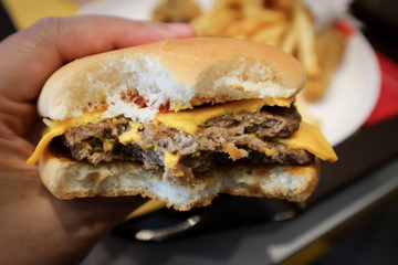 beef burger, eating burger