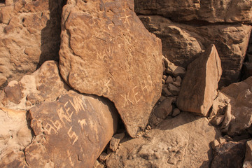 Vandalized historical landmark, Musayqirah Petroglyphs (Graffiti Rock), Riyadh Province, Saudi Arabia