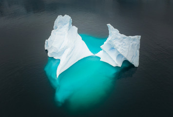 twice iceberg in water
