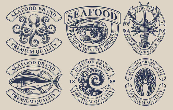 Set of vintage badges for seafood theme.