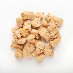 Pile of soy meat protein isolated on white background