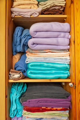 Wardrobe Kleiderschrank  with many different clothes