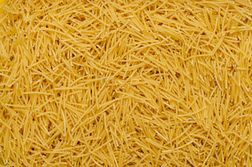 Pasta textured background for menu, website, postcard, decoration. Traditional Italian Raw Durum Wheat Pasta