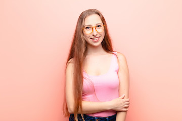 yound blonde woman laughing shyly and cheerfully, with a friendly and positive but insecure attitude