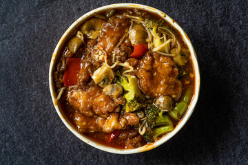 Take Away Shanghai Style Sea Bass Fish Fillets Food with Vegetables, Soy Sprouts and Broccoli in Plastic Box / Package.