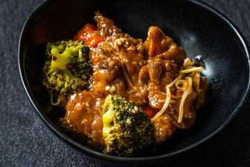 Shanghai Style Sea Bass Fish Fillets Food with Vegetables, Soy Sprouts and Broccoli.