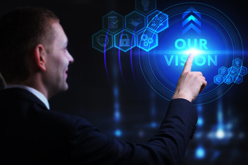 Business, Technology, Internet and network concept. Young businessman working on a virtual screen of the future and sees the inscription: Our vision