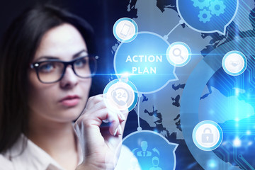 Business, Technology, Internet and network concept. Young businessman working on a virtual screen of the future and sees the inscription: Action plan
