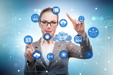 Cloud computing concept with woman pressing buttons