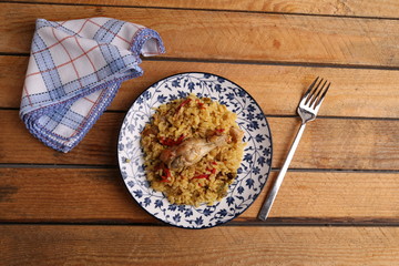plate of rice with chicken and peppers