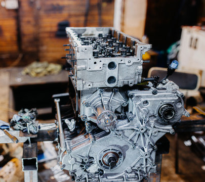car in-line engine repair, disassembled motor.