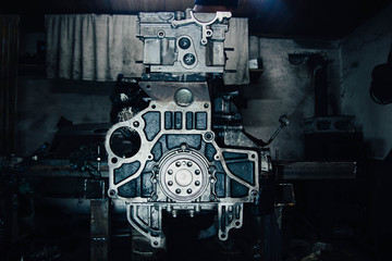 Fototapeta na wymiar car in-line engine repair, disassembled motor.