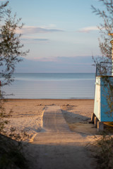 Romantic view on baltic beach seaside shore at dusk on a cloudy day