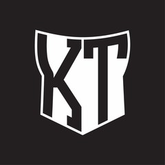KT Logo monogram with negative space abstract shield shape design template on black background