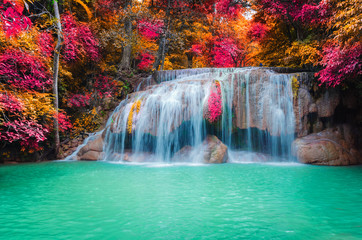 amazing nature cascade colorful autumn leaf waterfall heaven landscape with sun light outdoor travel in Thailand.