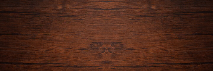 Seamless dark brown wooden board texture background with vignette