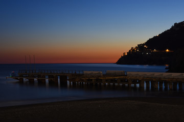 Obraz premium Night image of the promenade of an Italian town on the Amalfi coast