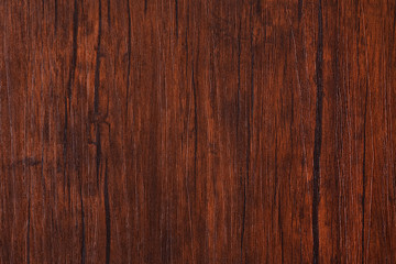 Naklejka premium Bezszwowe ciemnobrązowe drewniane deski tekstura tło z winietą