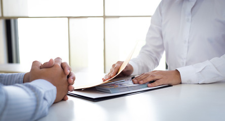  Businessmen make dollar payments while signing an investment agreement to be a partner in an illegal and successful manner, Bribery and corruption concept..