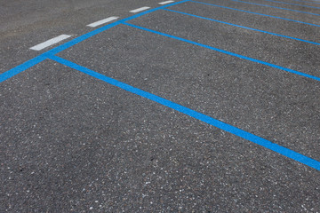  car park area with blue line for ticketing