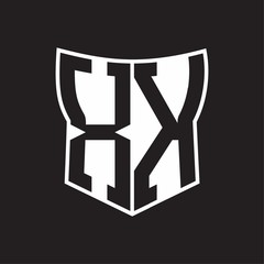XK Logo monogram with negative space abstract shield shape design template on black background