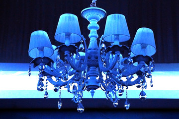 beautiful vintage chandelier on a white and blue background