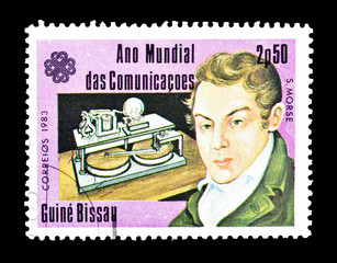Cancelled postage stamp printed by Guinea Bissau, that shows portrait of scientists Morse, circa...
