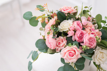 Bouquet composition with beautiful roses in a gift box. Wedding background, postcard with space for text