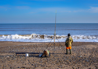 Fisherman on the beach